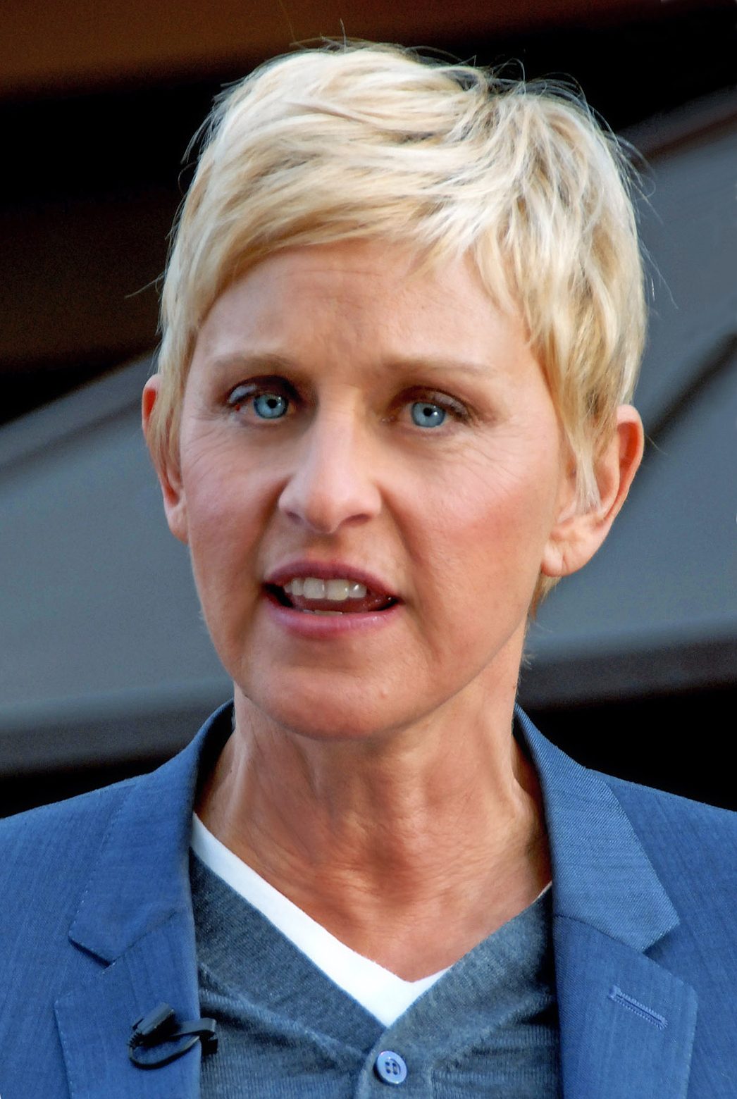 Ellen DeGeneres in a blue blazer at a 2011 book signing in Los Angeles
